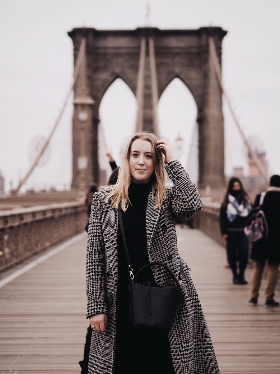 new york city travel guide winter cold weather brooklyn bridge reformation coat